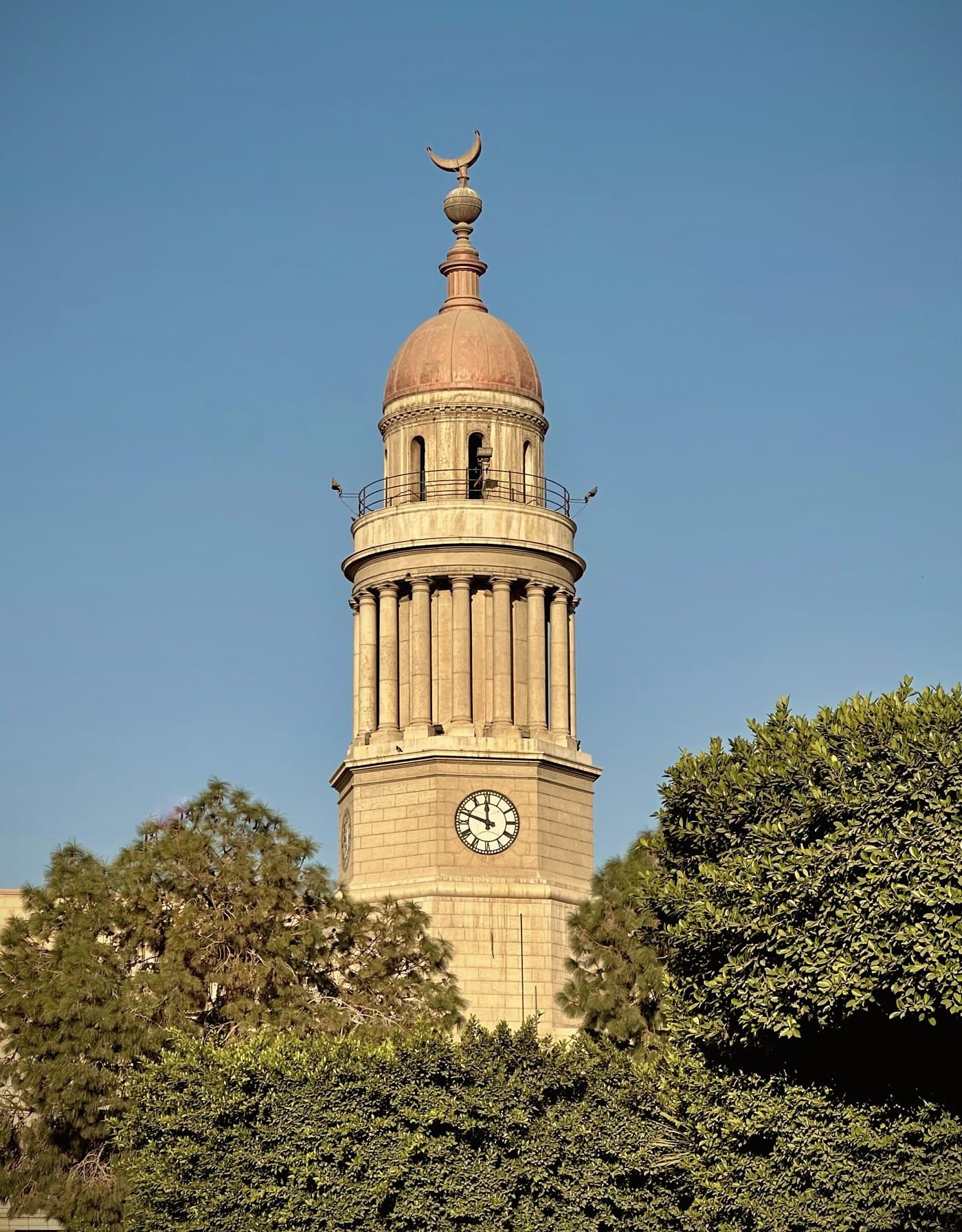 The clock tower of Kasr Al-Ainy above the trees, today